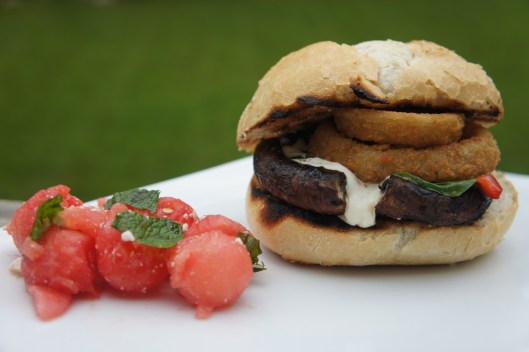Grilled Portebello Mushroom Burgers with roasted red peppers, fresh mozzarella, basil and onion rings